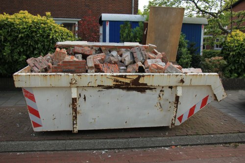 Professionals performing loft clearance in Maida Vale