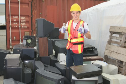 Furniture being cleared from a living room in Maida Vale